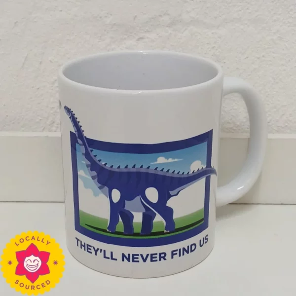 Mug, white with Barapasaurus design. Catch Phrase: They'll Never Find Us. Perfect Gift for Dinosaur Enthusiasts.